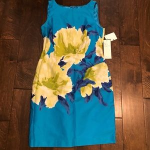 Blue floral sleeveless party dress. Size 6.